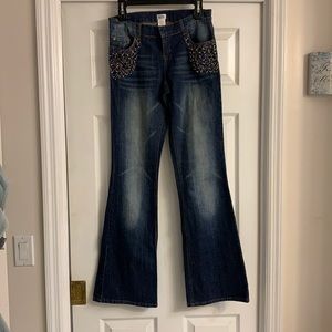 A pair of beaded jeans.